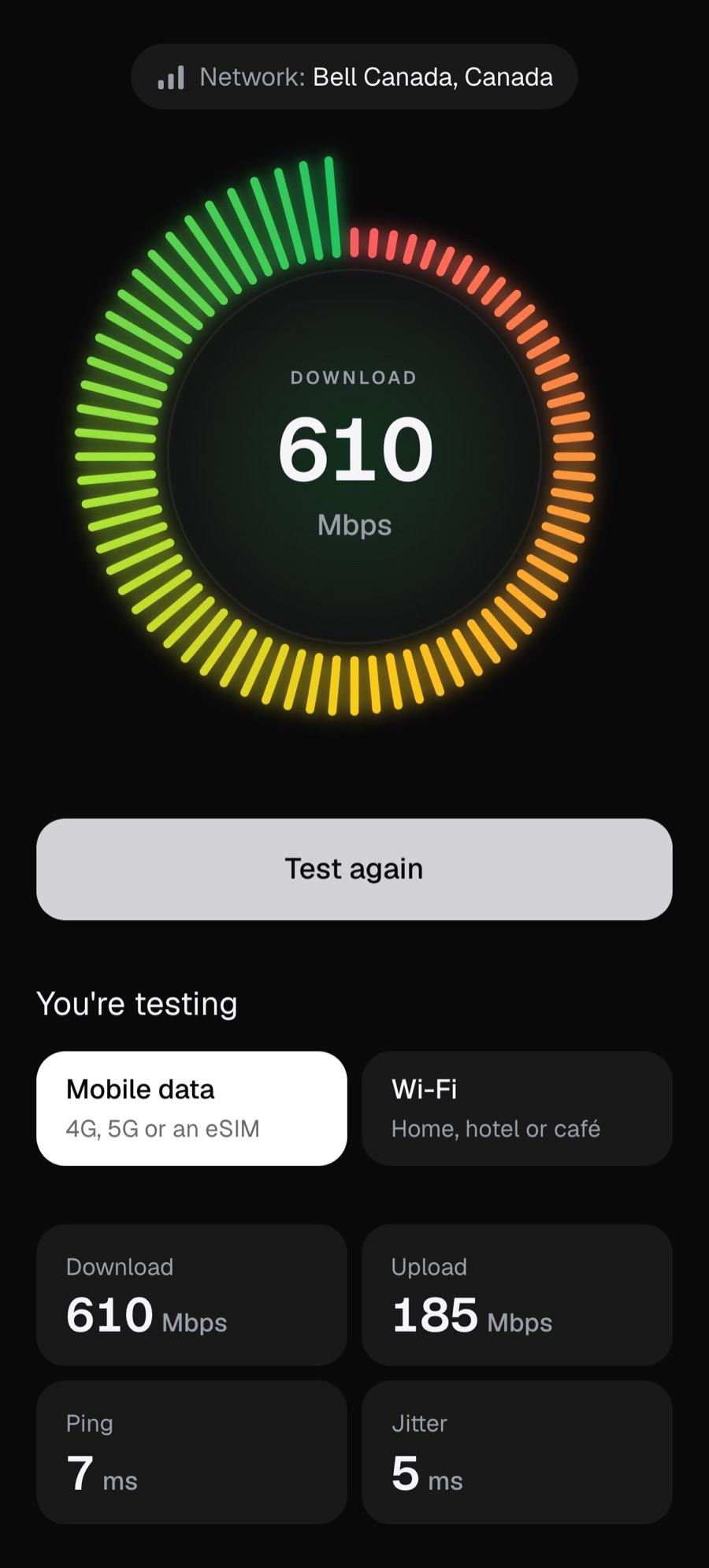 ArriGo internet speed test showing a download speed of over 500 Mbps on a red-to-green radial meter, with upload, ping and jitter below